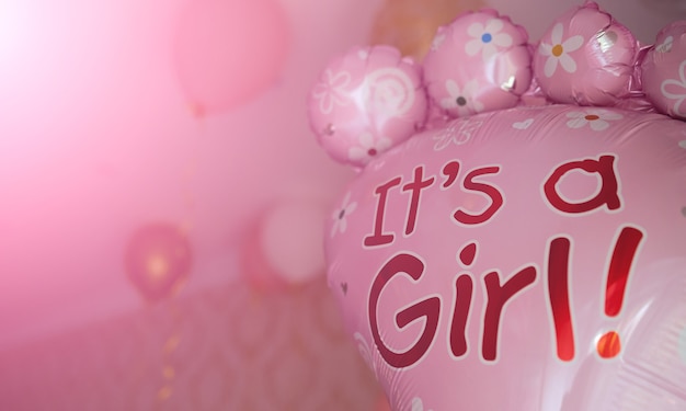 Photo pink balloon with text it's a girl gender reveal party. gender party. high quality photo