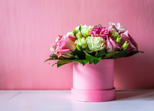 Pink basket with spring flower arrangement