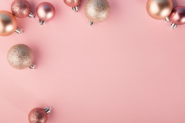 Pink baubles on pink background