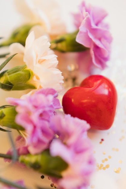 Pink and beige dianthus and heart