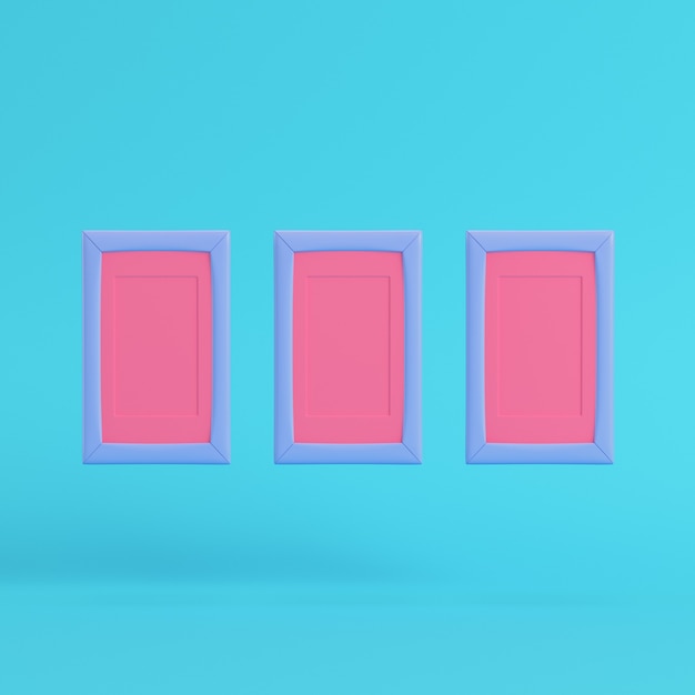 Pink blank frames on bright blue background