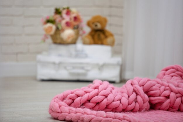 Pink blankets from Merino on the floor