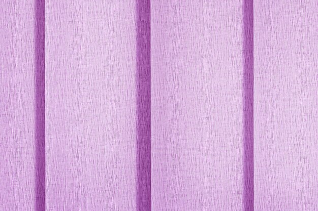 Pink blinds vertical blinds in full screen Closeup of textile surface texture