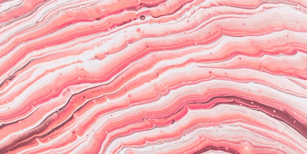 A pink and blue marble background with a pink marble texture.
