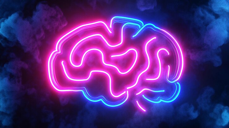 Pink and blue neon brain outline glowing brightly against a dark background