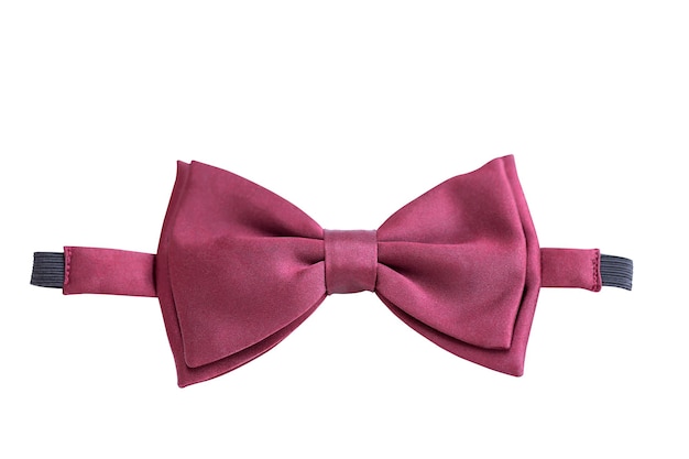 A pink bow tie with a pink ribbon on it.