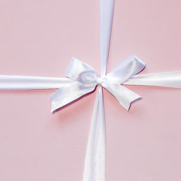 흰색 나비 선물이 있는 분홍색 상자