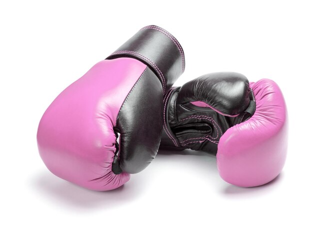 Pink boxing gloves isolated on white background The concept of protection of rights