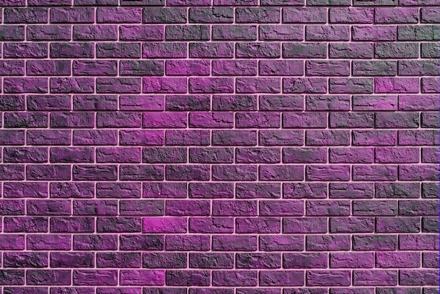 Photo pink brick wall. modern construction industry. building's facade.