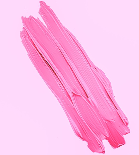 ピンクのブラシ ストロークまたは化粧汚れクローズ アップ美容化粧品と口紅の質感
