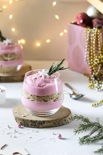 A pink cake with a candle in the middle