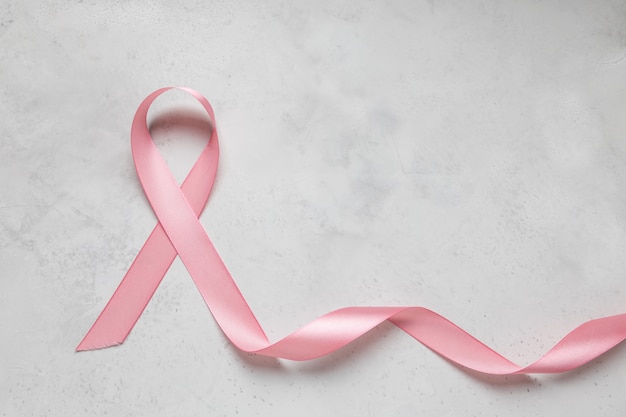 Photo pink cancer ribbon. breast cancer. breast cancer awareness month.