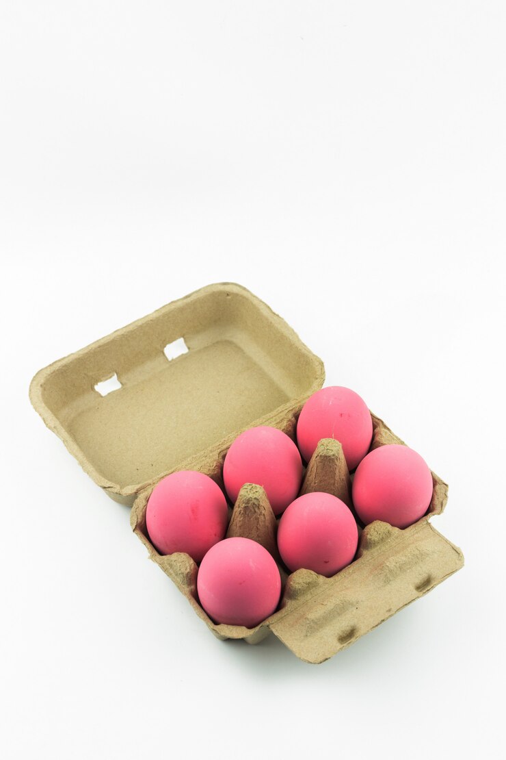 Pink Century eggs or preserved duck egg Pack isolated on white background