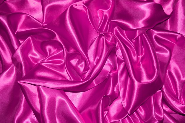 Pink cloth background abstract with soft waves