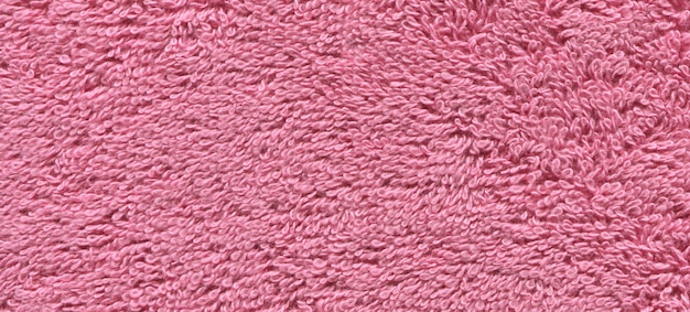 Pink color bath towel texture.