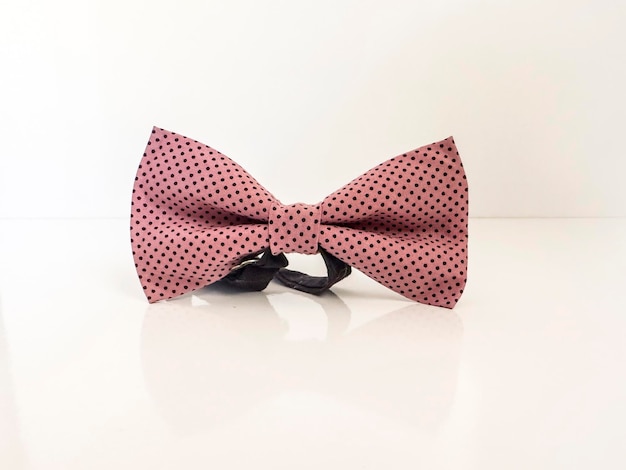 pink color polka dots bow for party