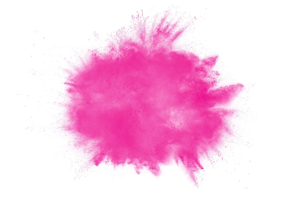 Photo pink color powder explosion on white background.