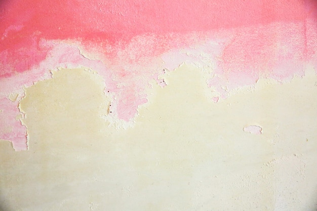 Pink coloured concrete background. Wall texture.