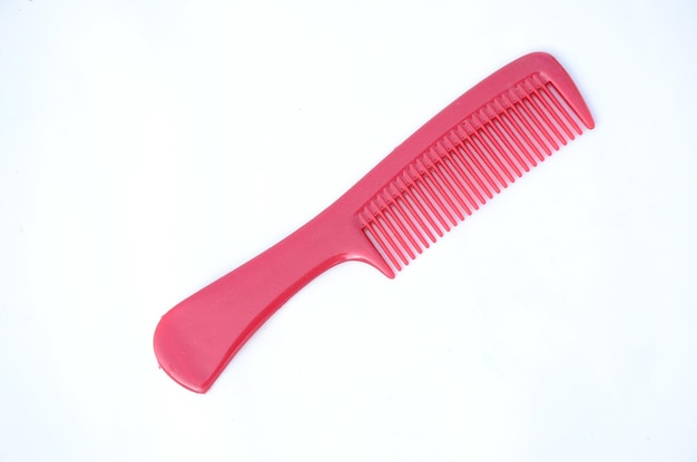 Pink comb isolated on white background