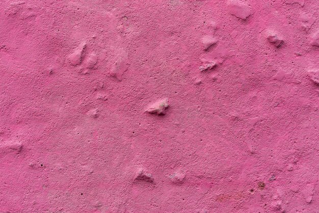 Pink concrete wall The concrete wall is spray painted pink