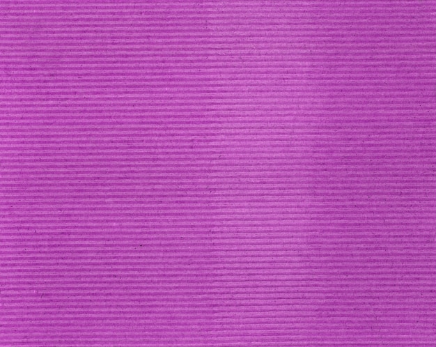 Розовый гофрированный картон текстуры фона