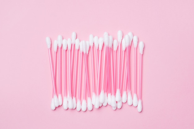 Photo pink cotton buds on pink.