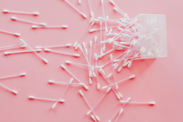 pink cotton buds poured out of the box