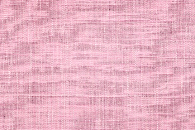 ピンクの綿織り生地のテクスチャ