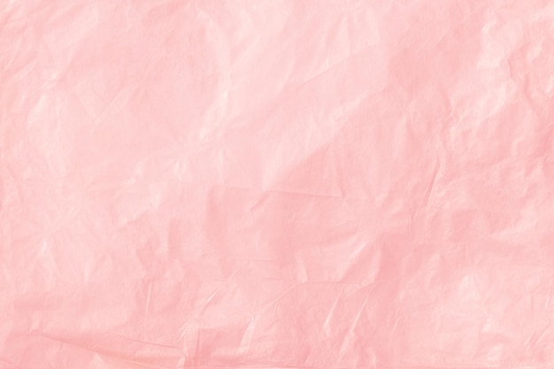 Pink crumpled kraft paper texture for background