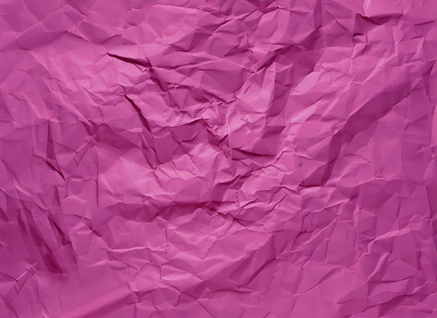 A pink crumpled paper with the word pink on it