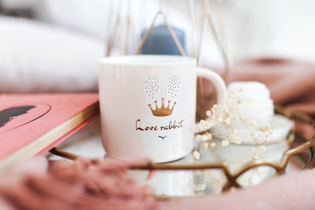 Pink cute mug on a mirrored tray