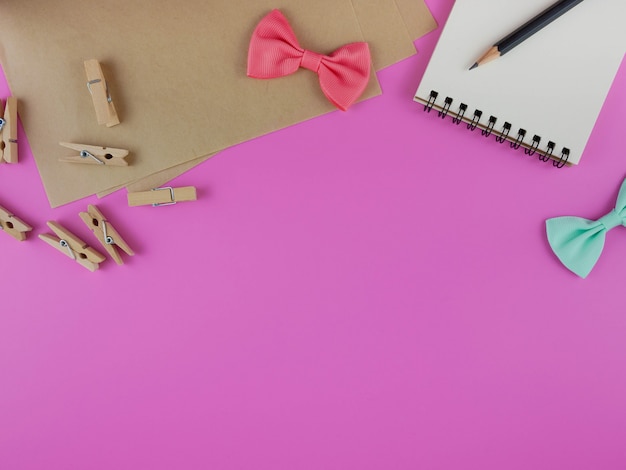 Pink desk with craft tools and copy space 