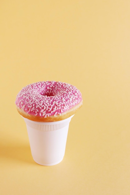 Pink donut and coffee