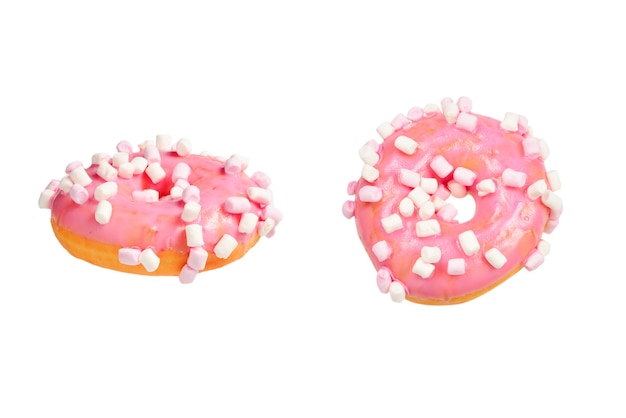 Pink donut with marshmallow isolated on white.