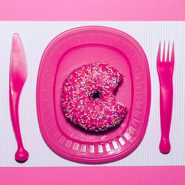 Photo pink donuts. fast food minimal art