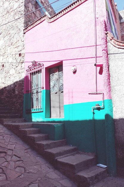 Photo pink door of building