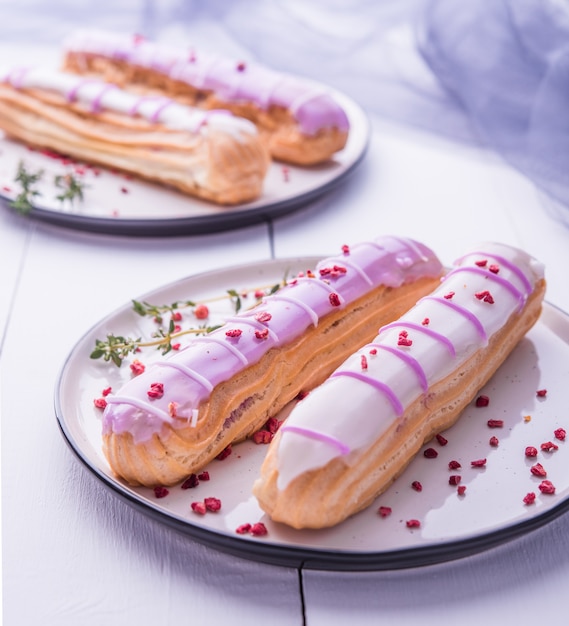 pink eclairs plate morning light violet