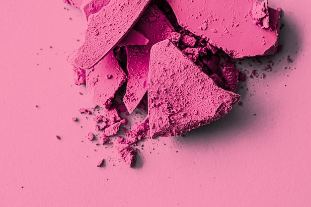 Pink eye shadow powder as makeup palette closeup crushed cosmetics and beauty texture