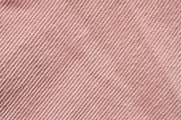 Pink fabric cloth texture background close up