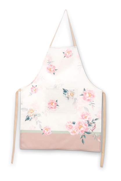 A pink floral apron hanging on a wall.