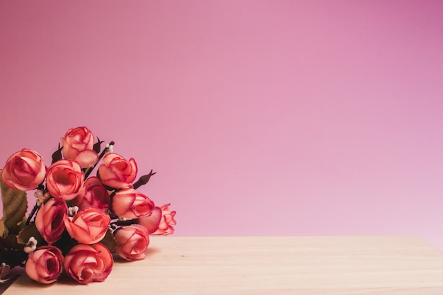 Pink flower and pink background with copy space