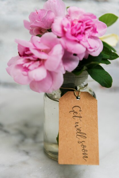 Photo pink flower with wishing label