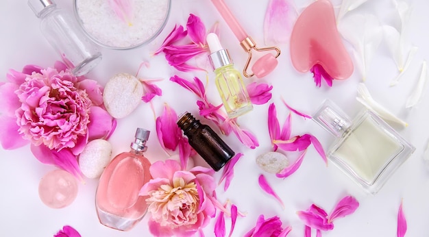 Pink flowers on white background spa facial Selective focus