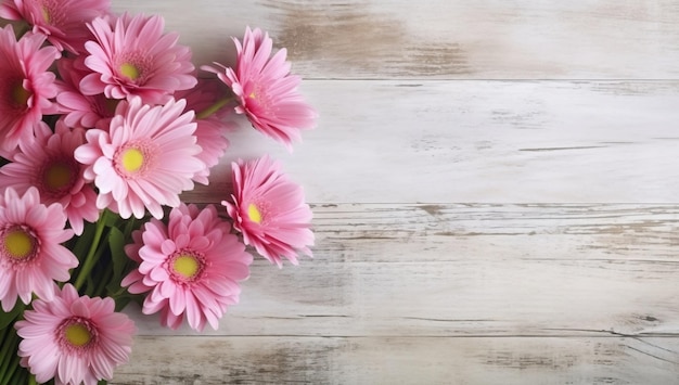 木製のテーブルにピンクの花