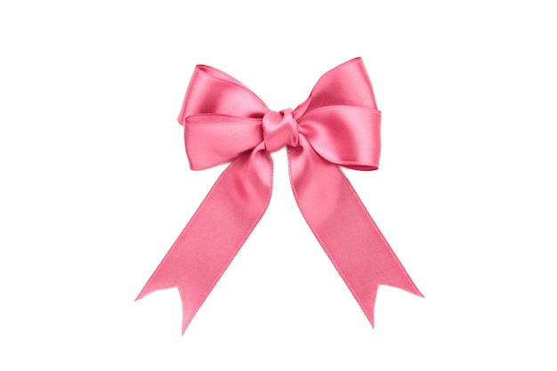 Photo pink gift bow isolated on white surface