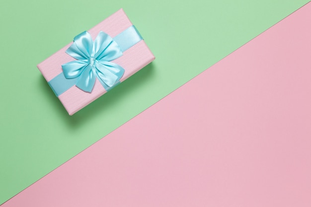 Pink gift box with blue bo