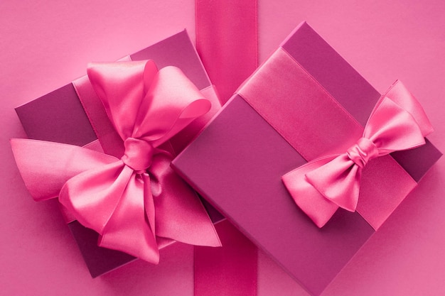 Pink gift boxes feminine style flatlay background