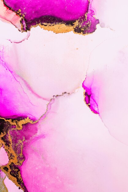 Pink gold abstract background of marble liquid ink art painting on paper .