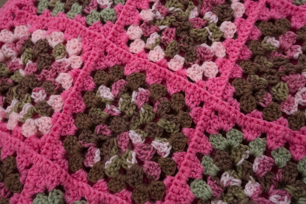 Foto coperta uncinetto quadrato rosa nonna