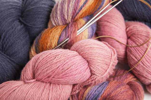 Pink gray multicolored yarn of wool in bundles for hand knitting handpainted in beautiful colors